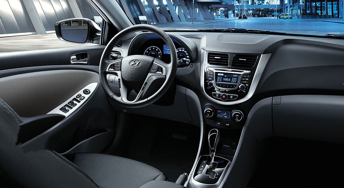 The interior view of the 2017 Hyundai Accent driver's seat and steering wheel